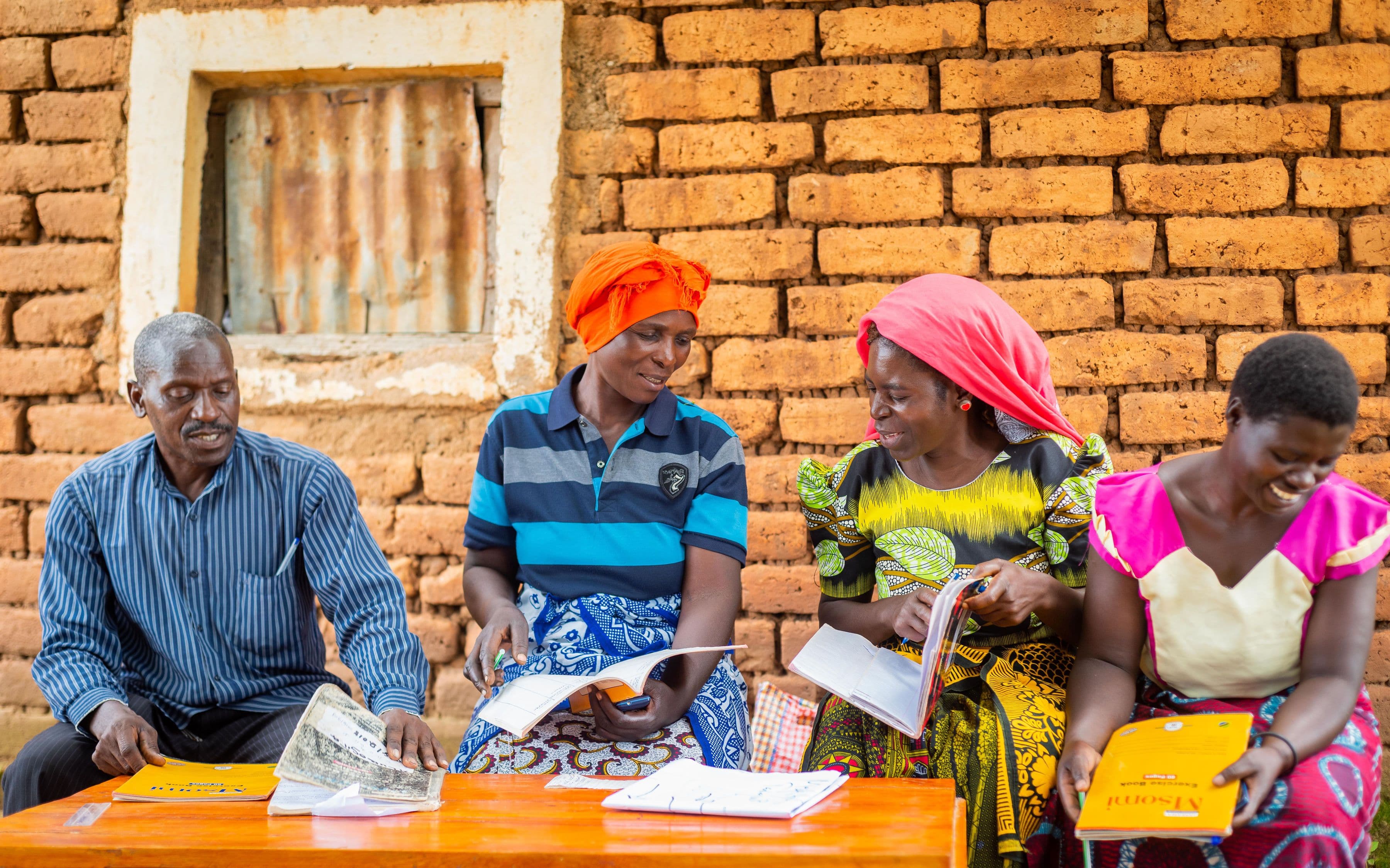 During meetings support for farmer families is discussed A farmer organization is meeting to discuss smallholder support