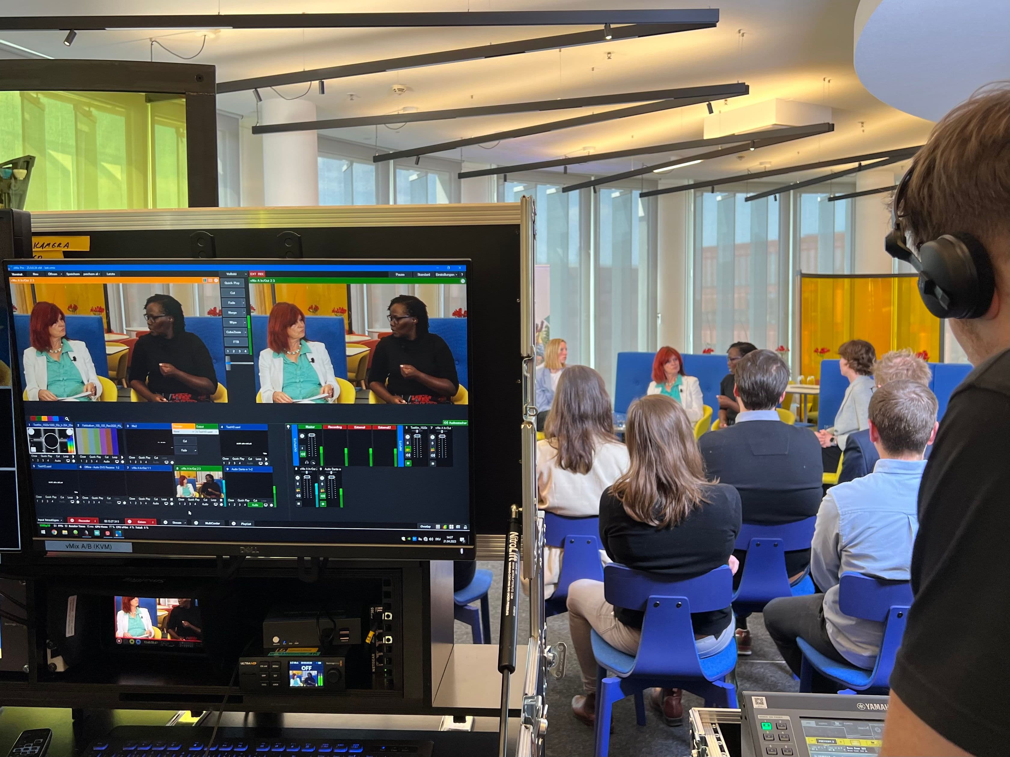 Localization as topic during a TeamUp Uganda panel discussion Set picture from a panel discussion