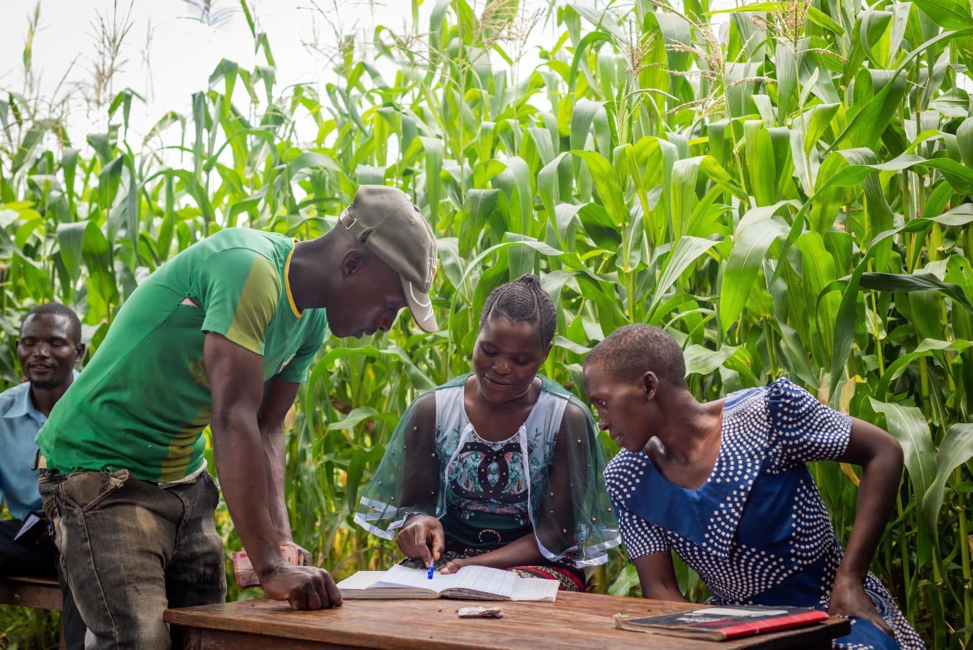 Faibe performing her secretarial duties during a youth group meeting